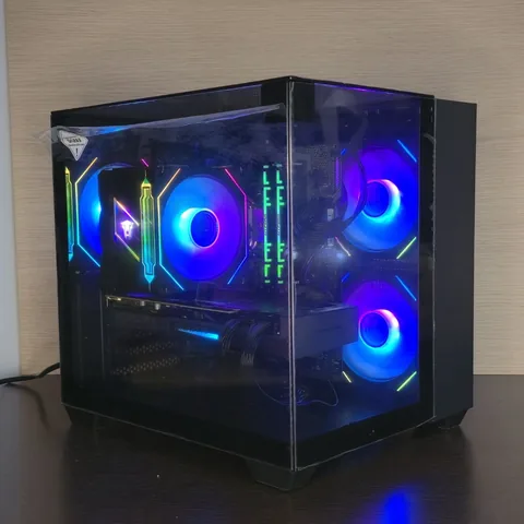 Black cube case with glass panels and blue and purple RGB fans