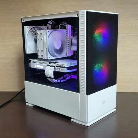 All-white build in a mesh case: white tower cooler, white GeForce RTX and white sleeved cables